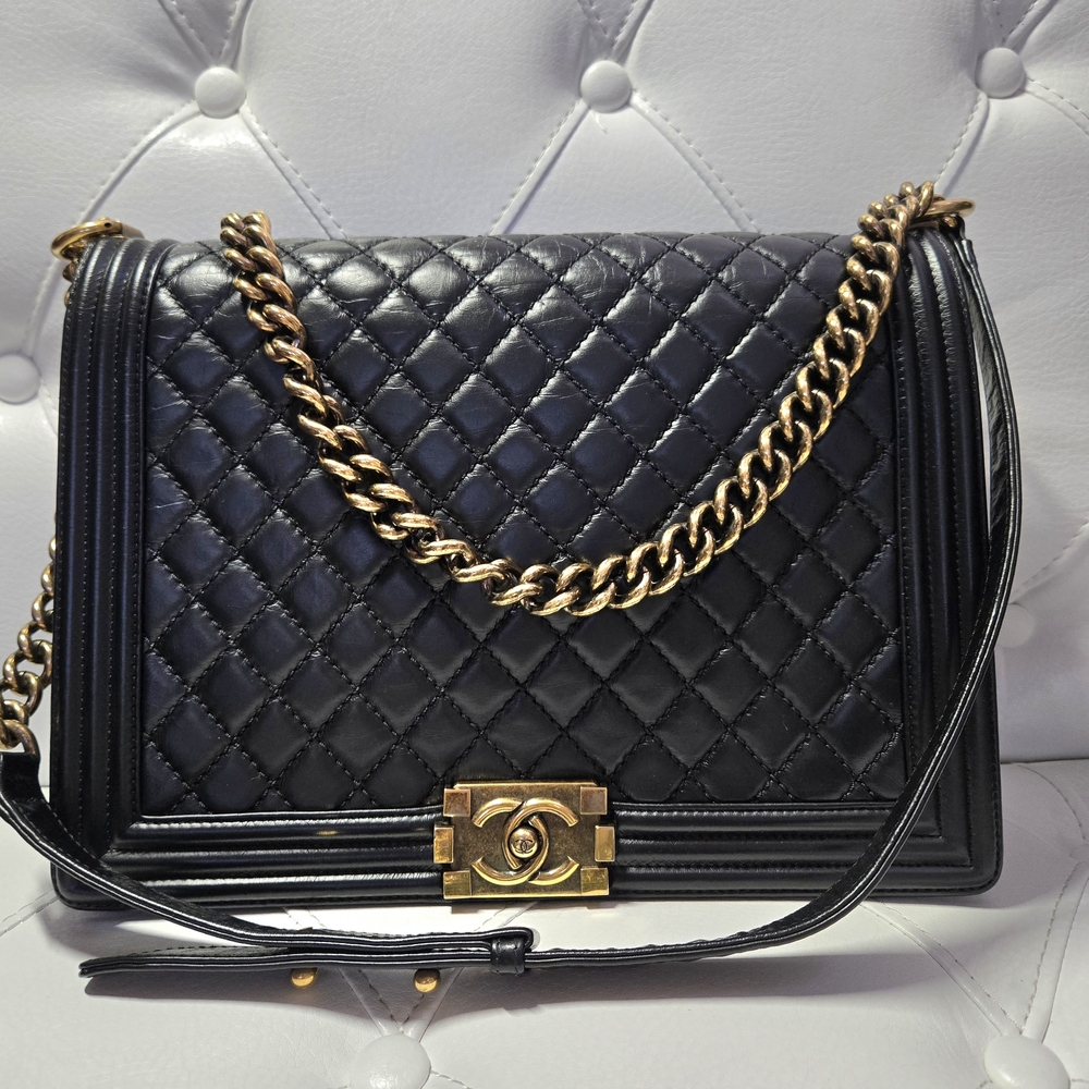 Chanel Large Boy Flap Bag in black glazed calfskin leather/gold COA Good.